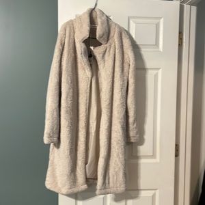 Angashion jacket below the knees with pockets!! Soft and nice size small NWT!